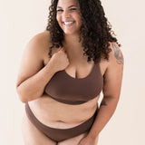 Model wearing the Kyte Baby's Women's Scoop Neck Bralette in Toffee