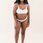 Model wearing Kyte Baby's Women's Scoop Neck Bralette in Blonde