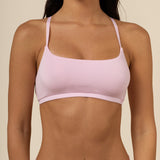 Model wearing the Women's Scoop Neck Bralette in Peony paired with matching briefs ::: Model is 32C wearing size S ///