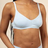 Close up of a model wearing the Women's V-Neck Bra in Breeze and matching briefs  ::: Model is 32C wearing size S ///