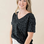 Model wearing the Women's Relaxed Fit V-Neck in Midnight Leopard