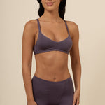 Brunette model wearing the Women's V-Neck Bra and Boxers in  Currant