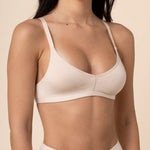 Close up of the Women's V-Neck Bra in Blonde on a model wearing matching boxers  ::: Model is 32C wearing size S ///