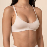 Close up of the Women's V-Neck Bra in Blonde on a model wearing matching boxers  ::: Model is 32C wearing size S ///