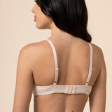Model showcasing the back and straps on the  V-Neck Bra in Blonde