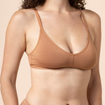 Model wearing the Women's V Neck Bra in Latte paired with matching briefs ::: Model is 34D wearing size M ///