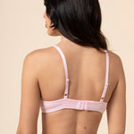 Model show casing the back and straps on the Women's V-Neck Bra in Peony