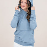 Model looking to the side with a hoodie while modeling the Kyte Women's French Terry Nursing Hoodie in Slate