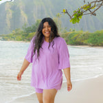 Smiling model in the Women’s Biker Short Set in Poi