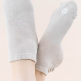The Kyte Baby logo on the toe of the Women's Ankle Socks 3-Pack in Neutral