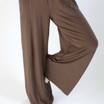 Close up of the Women's Wide Leg Pant in Espresso with one leg up