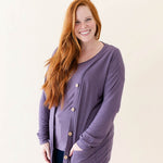 Female modeling the Bamboo Jersey Adult Cardigan in Currant paired with a Currant shirt and dark wash jeans