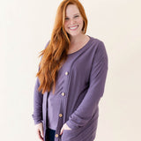 Female modeling the Bamboo Jersey Adult Cardigan in Currant paired with a Currant shirt and dark wash jeans