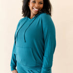 Female modeling the Women's Ribbed Hoodie in Loch paired with Loch Jogger Pants