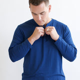 Male model unbutton the Men's Long Sleeve Henley Top in Tahoe