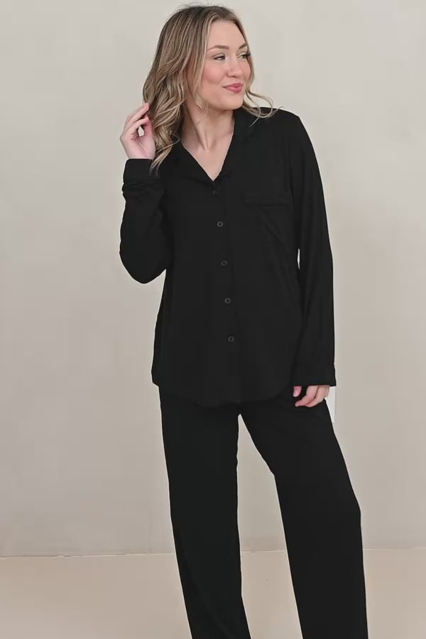 Woman modeling all black long sleeve bamboo pajama set