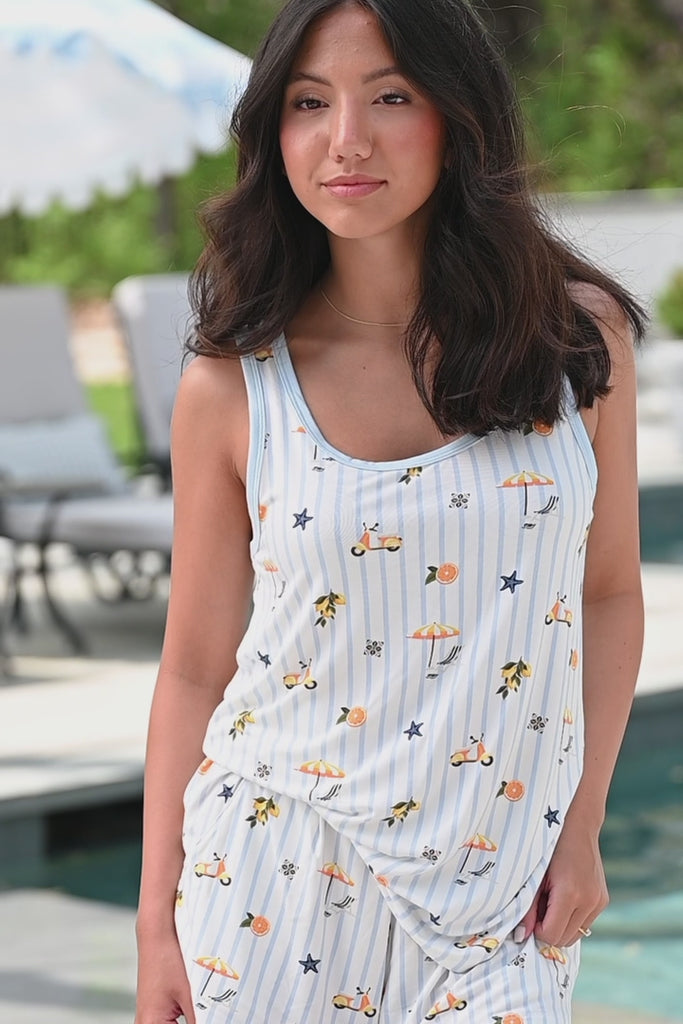 Models posing wearing Kyte Women's  tank set in Amalfi Coast print by the pool

::: Model is 5'2" wearing size S ///