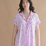 Video of model wearing pink purple short sleeve pajama set with cocktail print
::: Model is 5'6" wearing size S ///