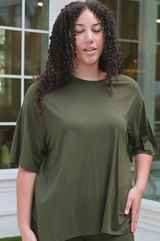 Video of woman modeling green biker short set ::: Model is 5'9" wearing size L ///