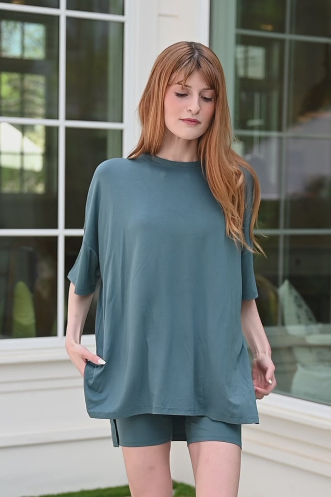 Video of woman modeling blue biker short set ::: Model is 5'6" wearing size S ///