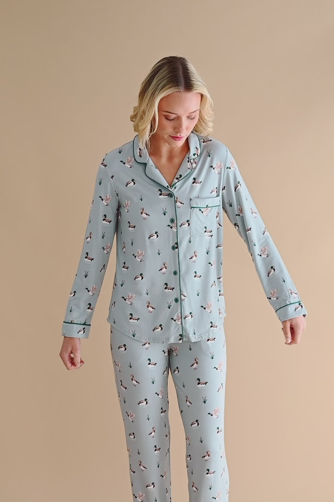 Model wearing long sleeve blue pajamas with a duck pattern ::: Model is 5'9" wearing size S ///