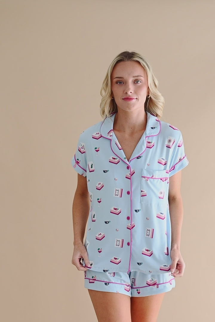 Model wearing short sleeve light blue pajama set with a Mahjong tile pattern 