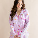 video of model wearing cocktail printed pink pajamas ::: Model is 5'7" wearing size S ///