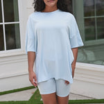 Video of model in biker short set in a light blue color ::: Model is 5'0" wearing size XS ///