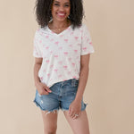 Video of woman modeling  Women’s Relaxed Fit V-Neck in Bow