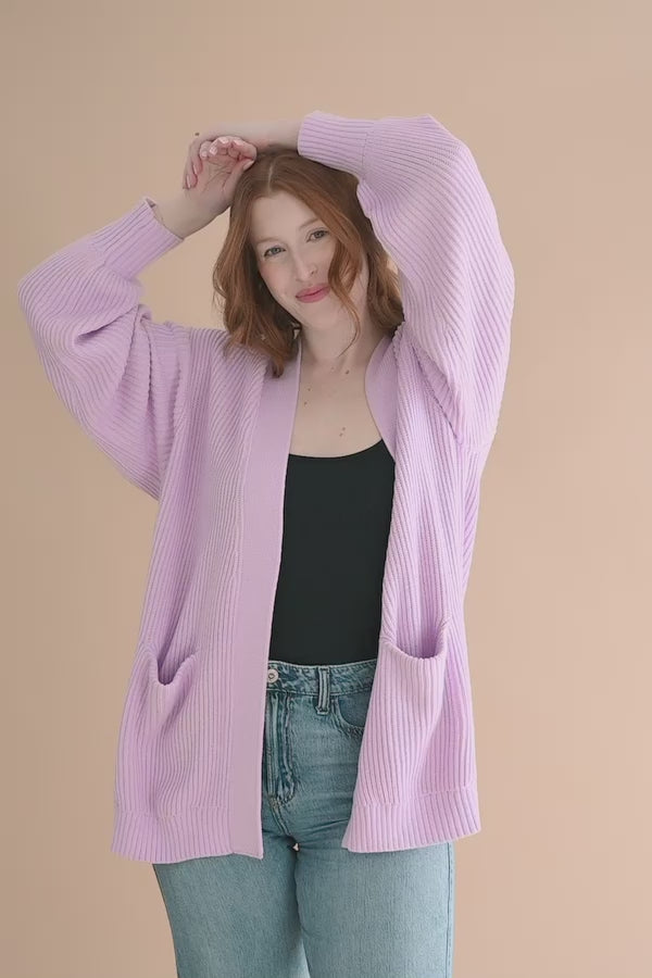 Video of model wearing the Chunky Knit Women's Oversized Cardigan in Thistle