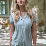 Video of woman modeling a short sleeve light blue pajama set with white piping ::: Model is 5'9" wearing size XS ///