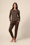 Woman wearing a dark brown jogger pajama set ::: Model is 5'9" wearing size S ///
